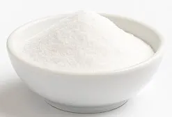 Magnesium glycinate powder in a white bowl